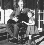 FDR in a wheelchair, with dog and small child